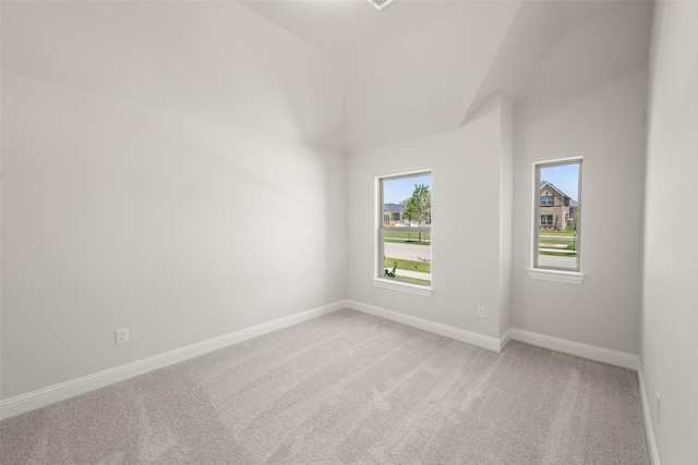 2009 Elm Pl, Northlake, TX 76247 - unfurnished room featuring light carpet and vaulted ceiling