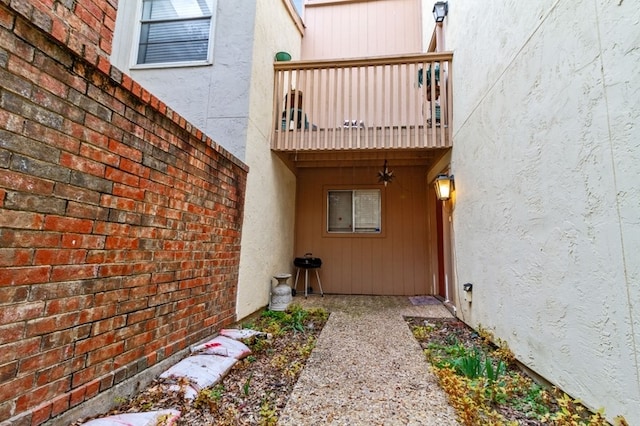 doorway to property with a balcony