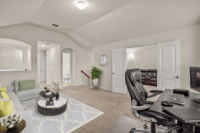 office featuring carpet floors and lofted ceiling