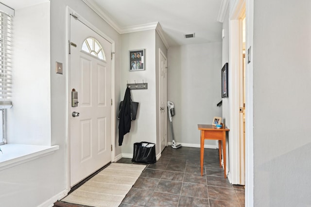 entrance foyer featuring ornamental molding