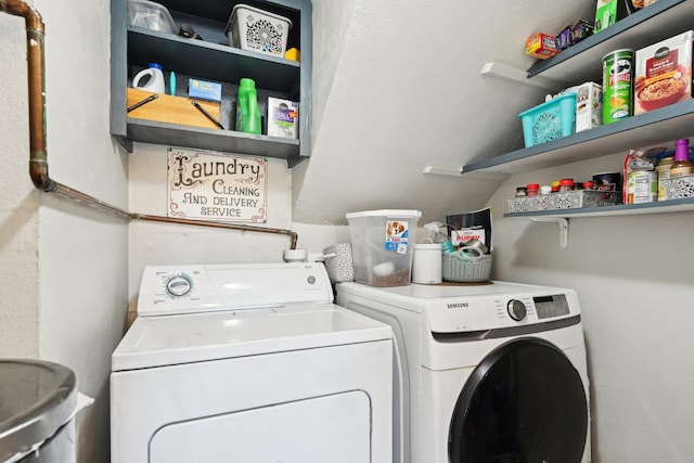 laundry area featuring washing machine and dryer