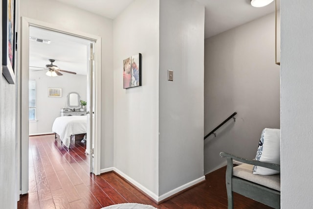 hall with dark hardwood / wood-style floors