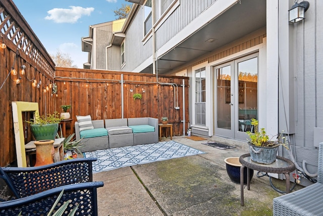 view of patio with outdoor lounge area and french doors