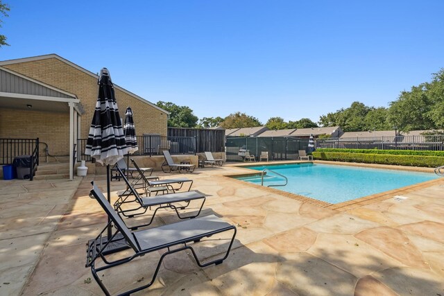 view of pool with a patio area