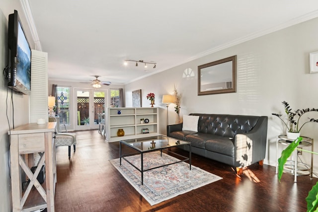 living room featuring ceiling fan, french doors, dark hardwood / wood-style floors, and ornamental molding