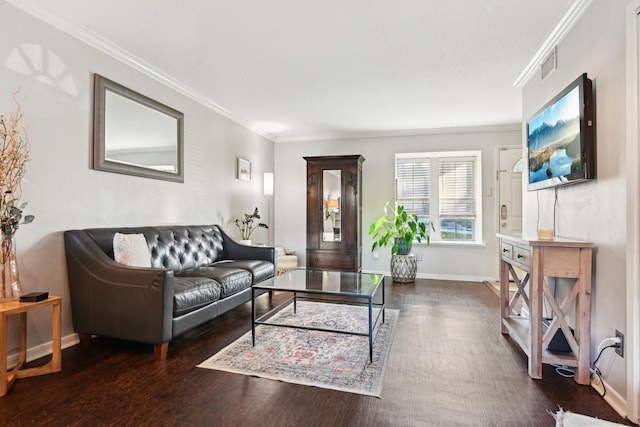 living room featuring crown molding and dark hardwood / wood-style flooring