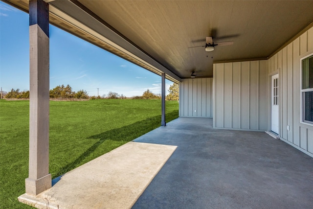 view of patio featuring ceiling fan