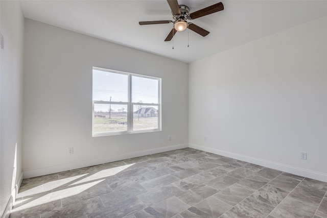 unfurnished room featuring ceiling fan