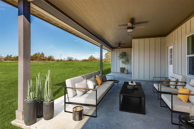 view of patio featuring an outdoor living space and ceiling fan