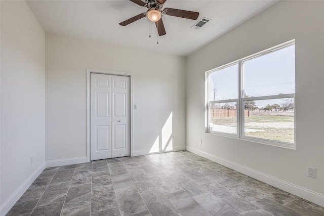 empty room with ceiling fan