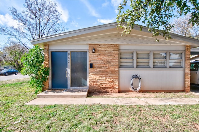 exterior space with a lawn