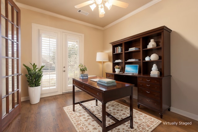 office area with ornamental molding, dark wood-type flooring, and visible vents