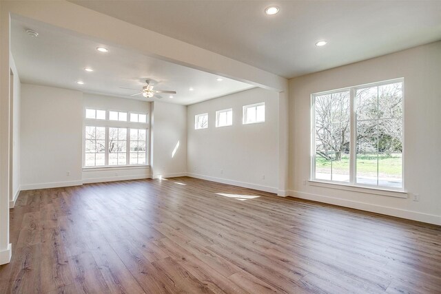 interior space featuring electric dryer hookup, baseboards, and laundry area