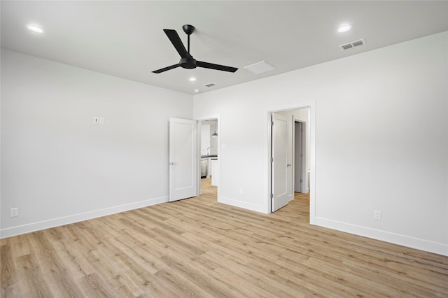 unfurnished bedroom featuring ceiling fan and light wood-type flooring