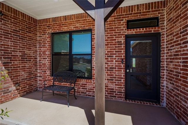 entrance to property featuring a porch