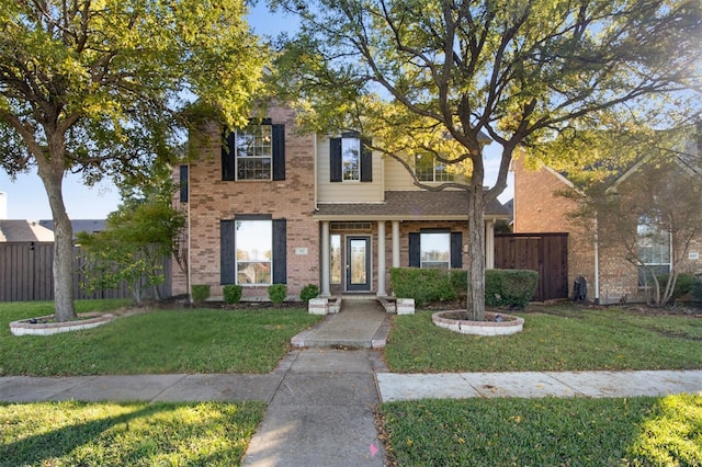 view of front of property featuring a front yard