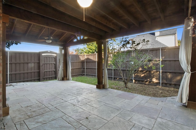 view of patio / terrace featuring ceiling fan