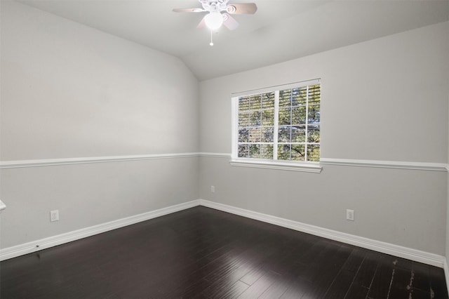 unfurnished room with vaulted ceiling, hardwood / wood-style floors, and ceiling fan