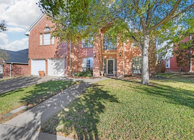 view of front of house featuring a garage and a front lawn