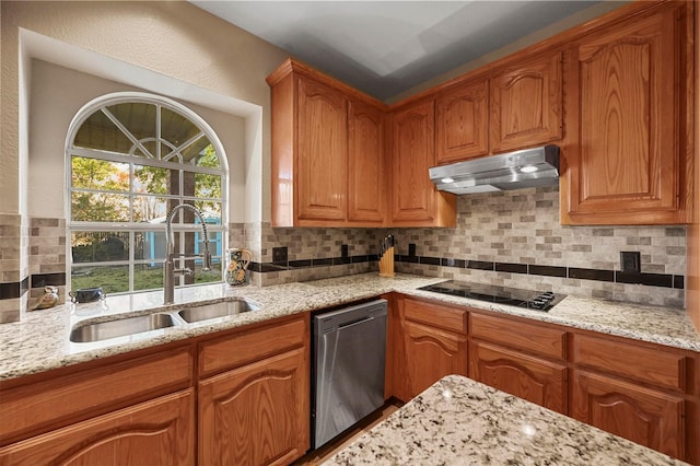 kitchen featuring sink, dishwasher, light stone counters, black electric stovetop, and decorative backsplash