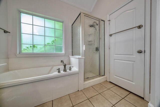 bathroom featuring tile patterned flooring, crown molding, and independent shower and bath