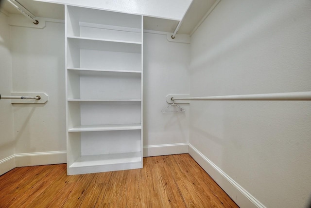 walk in closet featuring light wood-type flooring