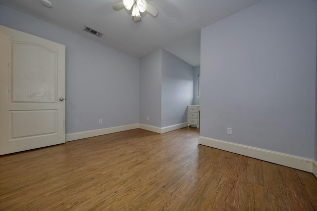 additional living space with ceiling fan and light hardwood / wood-style floors