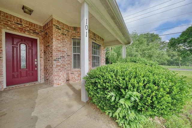 entrance to property with a porch