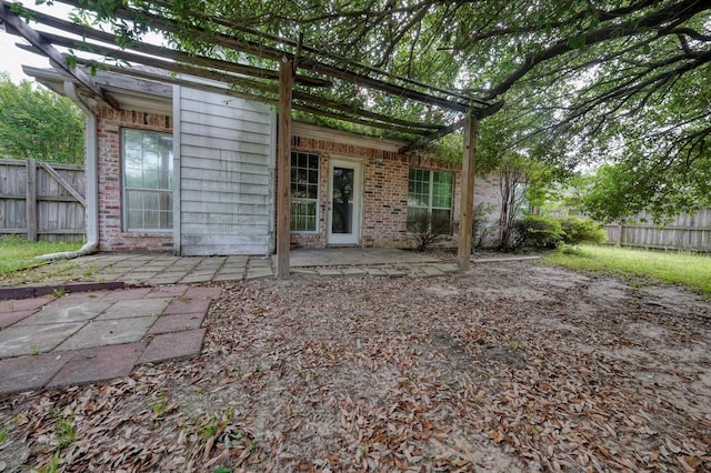 back of house featuring a patio