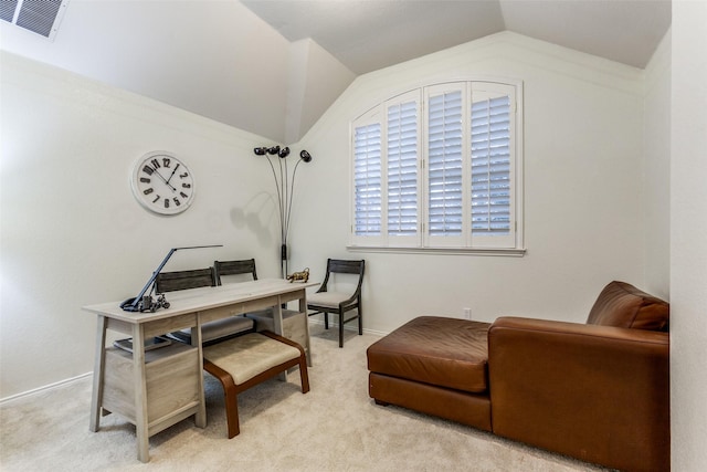 home office featuring carpet floors, lofted ceiling, visible vents, and baseboards