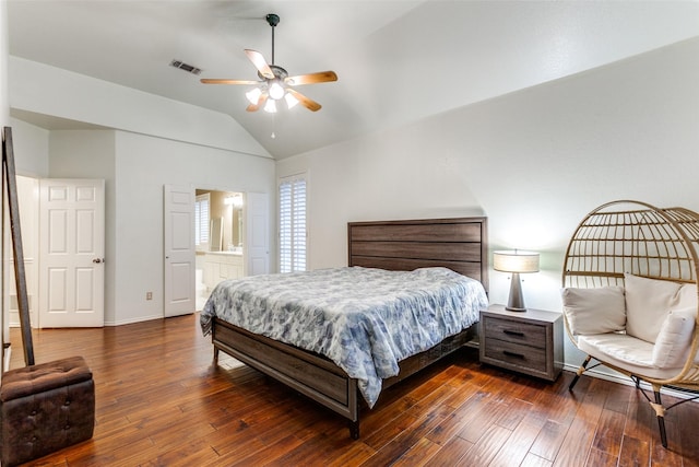 bedroom featuring baseboards, vaulted ceiling, visible vents, and dark wood finished floors