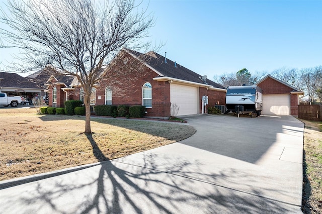 view of front facade with a front lawn and a garage