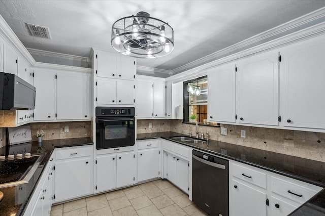 kitchen featuring white cabinetry, sink, decorative backsplash, and black appliances