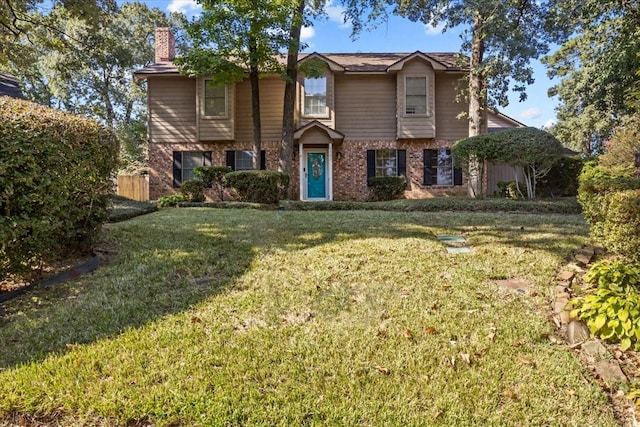 view of front of property featuring a front lawn