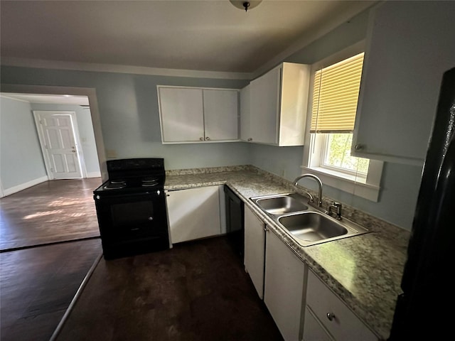 kitchen featuring white cabinets, dark hardwood / wood-style flooring, black appliances, and sink