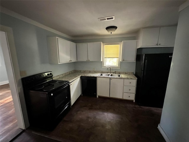 kitchen featuring white cabinets, sink, and black appliances