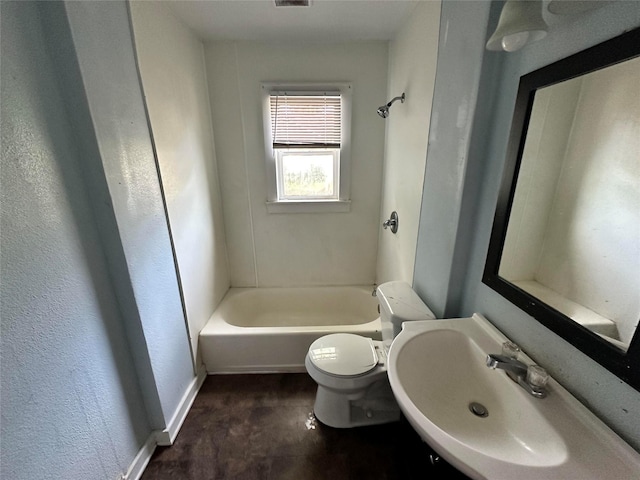 bathroom featuring toilet and sink