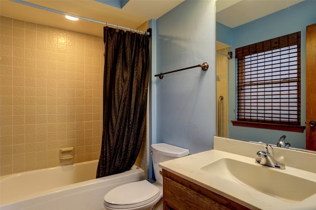 full bathroom featuring vanity, shower / bathtub combination with curtain, and toilet