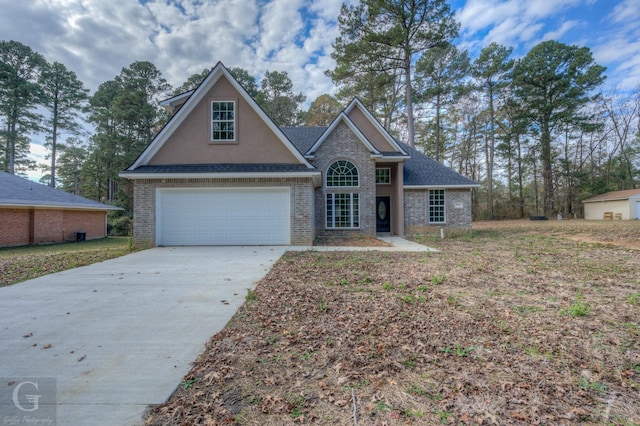 front of property with a garage