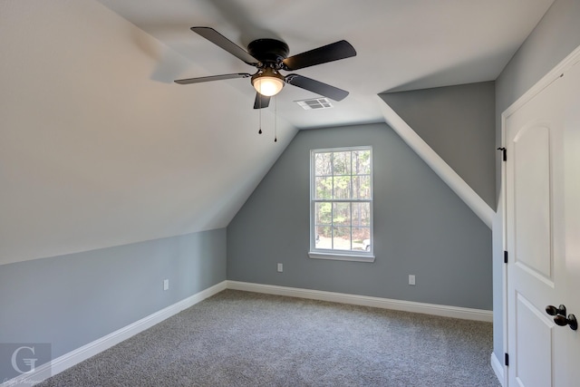 bonus room with carpet floors, vaulted ceiling, and ceiling fan