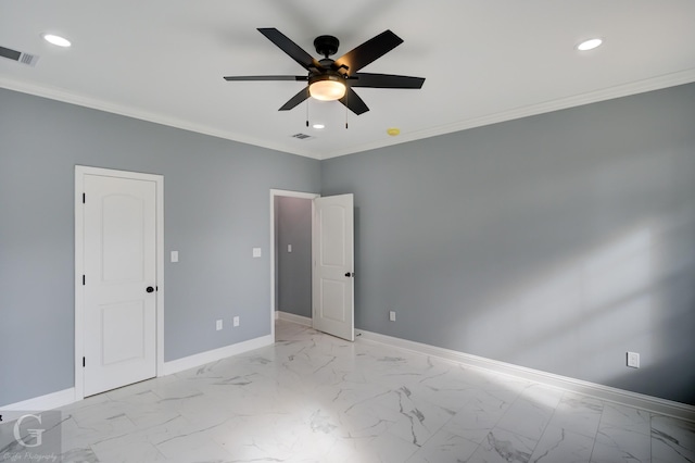 unfurnished room with ceiling fan and ornamental molding