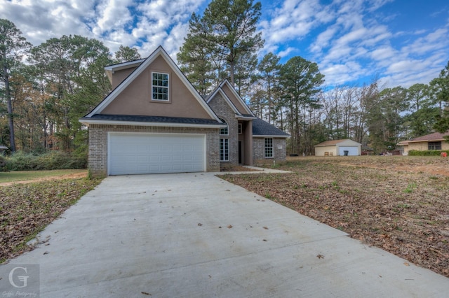 view of front of home with a garage