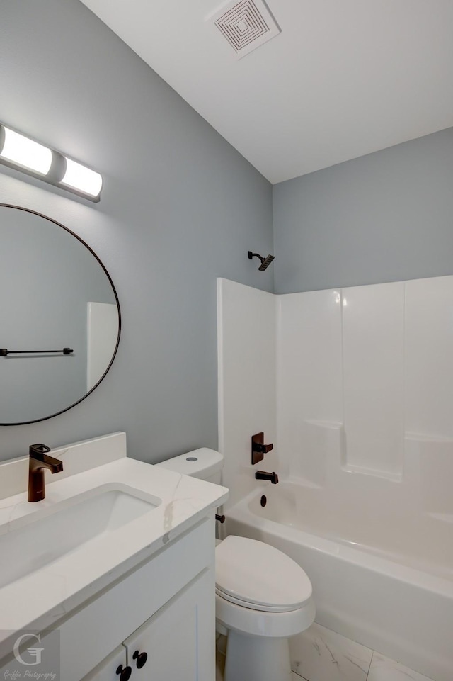 full bathroom featuring shower / tub combination, vanity, and toilet