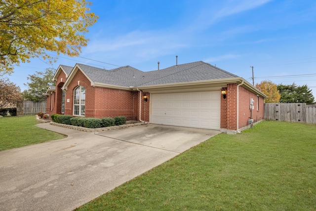 single story home with a garage and a front yard