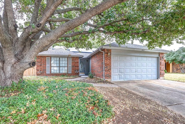 single story home with a garage