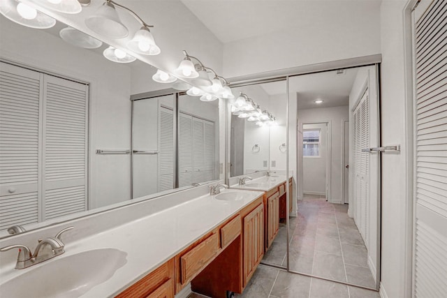 bathroom featuring tile patterned floors and vanity