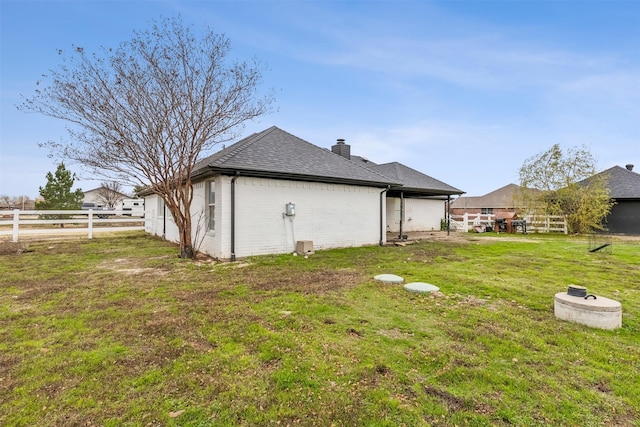 exterior space with a lawn