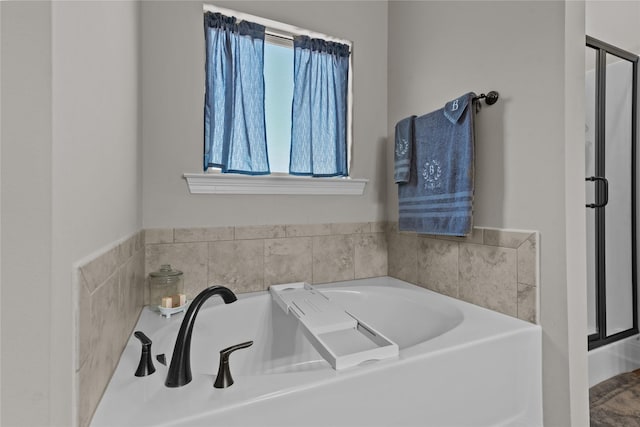 bathroom with a bathing tub