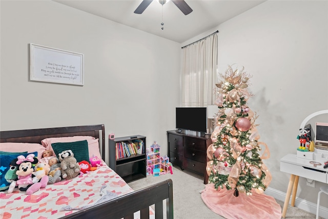 carpeted bedroom with ceiling fan