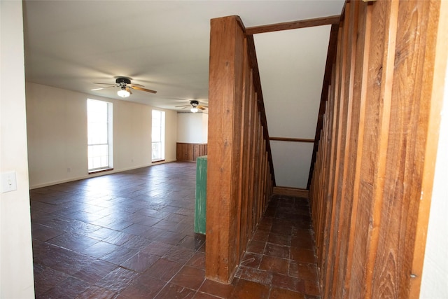 unfurnished room featuring ceiling fan